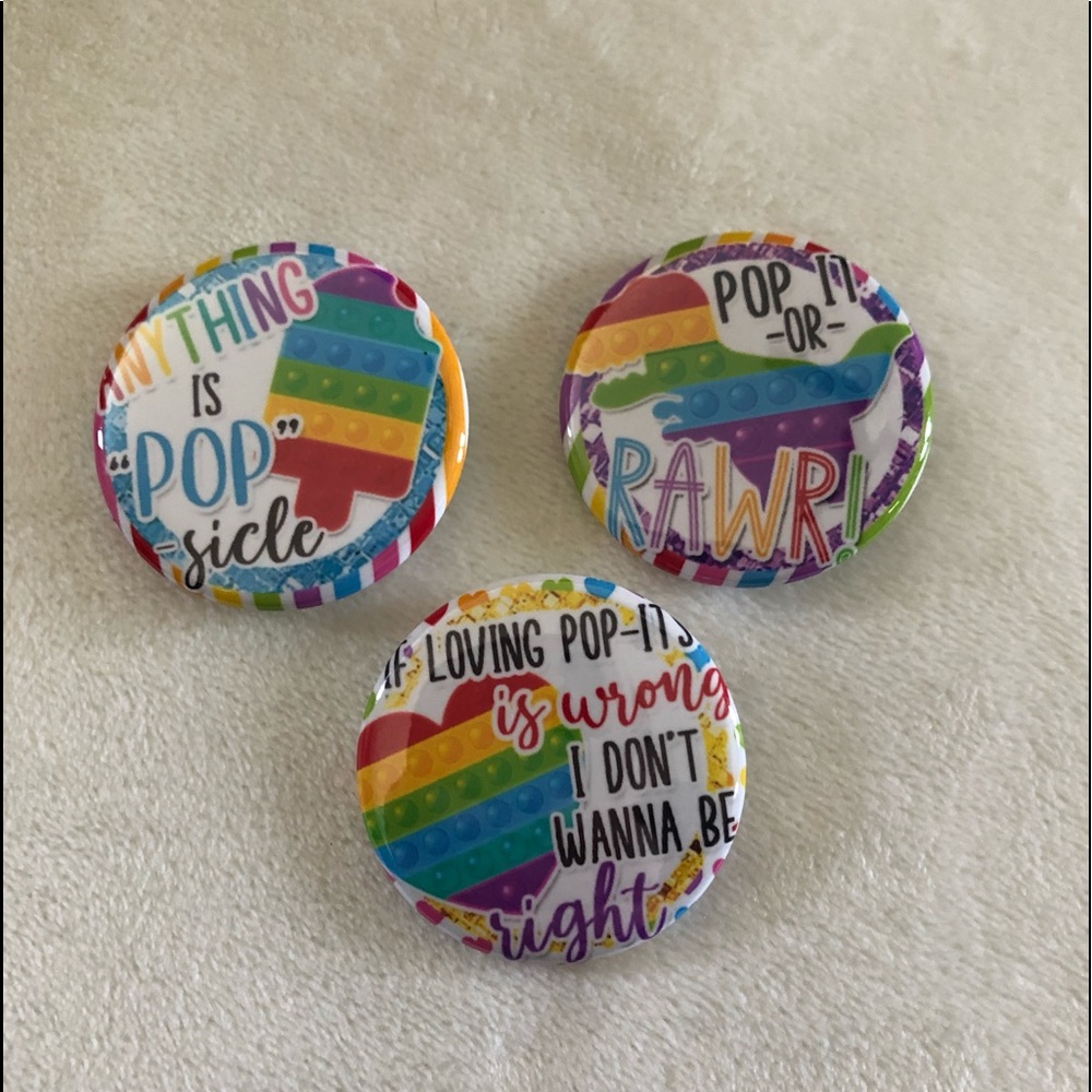 I.5 inch pop it or rawr pin back button set
